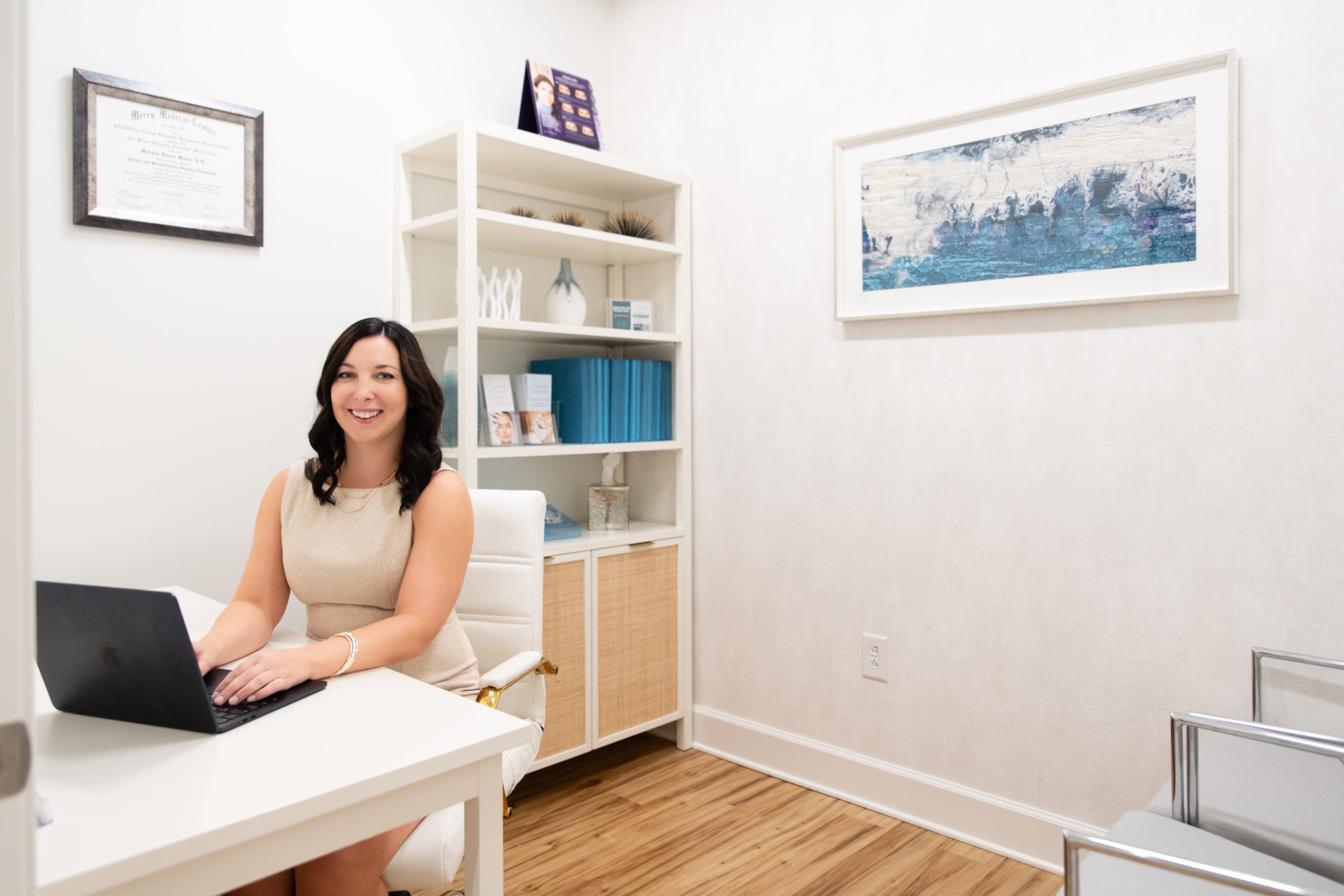 Dr. Marks working at her desk